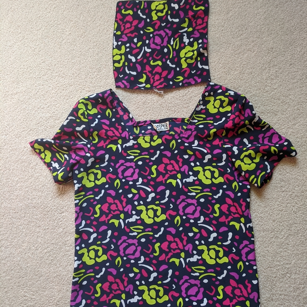 Dressy blouse with square pocket scarf.